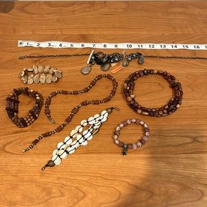 Lot of seven brown necklaces and bracelets